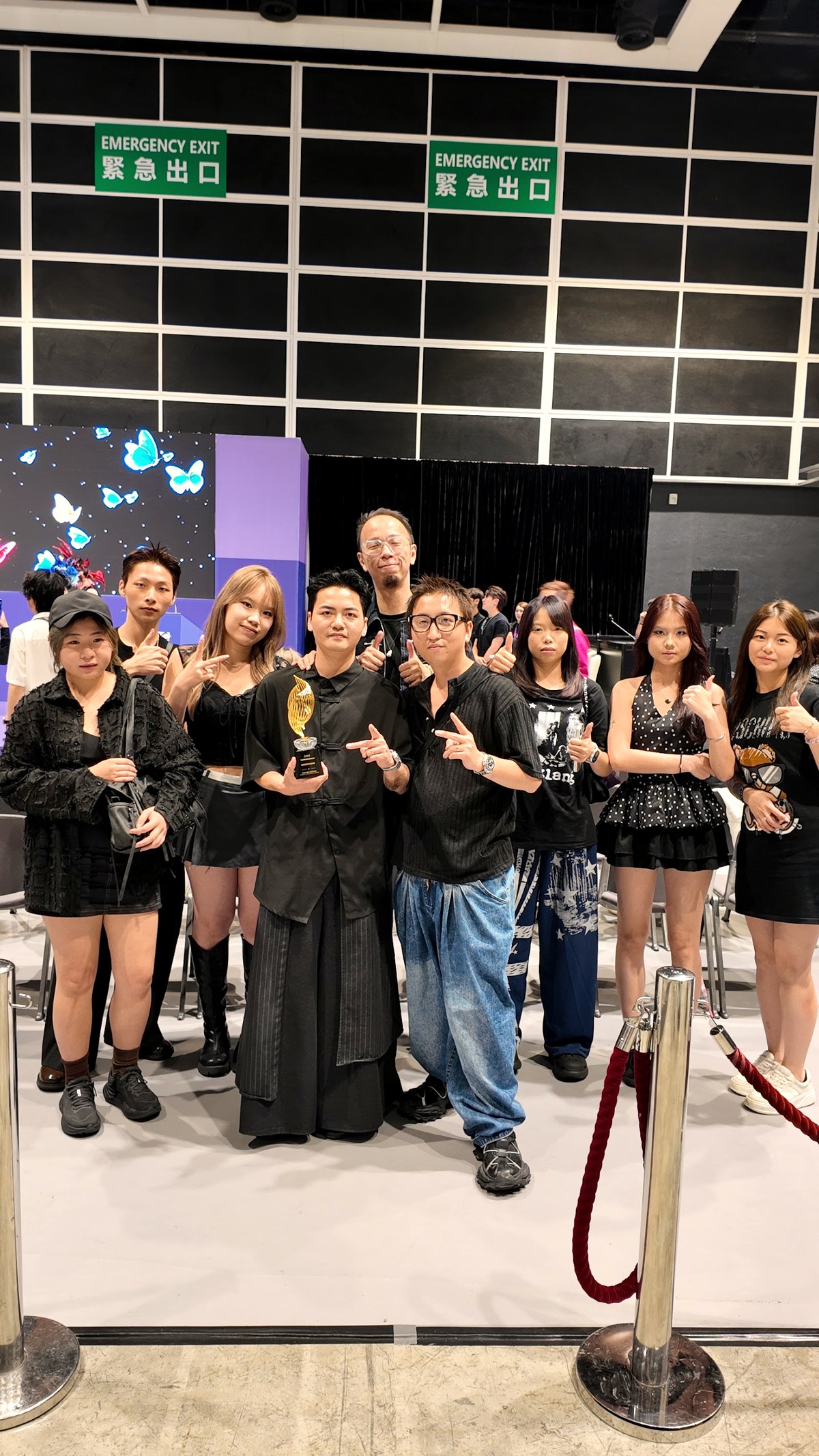 The Godshand Hair Salon team holding an industry award